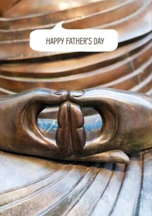 A seated buddha with hands together with text 'Happy Father's Day'