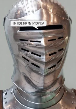 A person dressed in armour - and text 'I'm here for my interview'