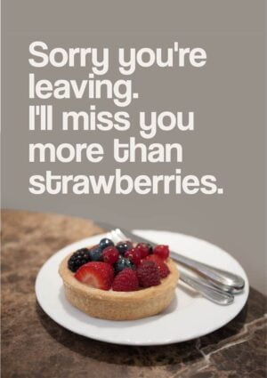 A fruit tart on a white plate with knife and fork and text 'Sorry You're Leaving. I'll Miss You More Than Strawberries'