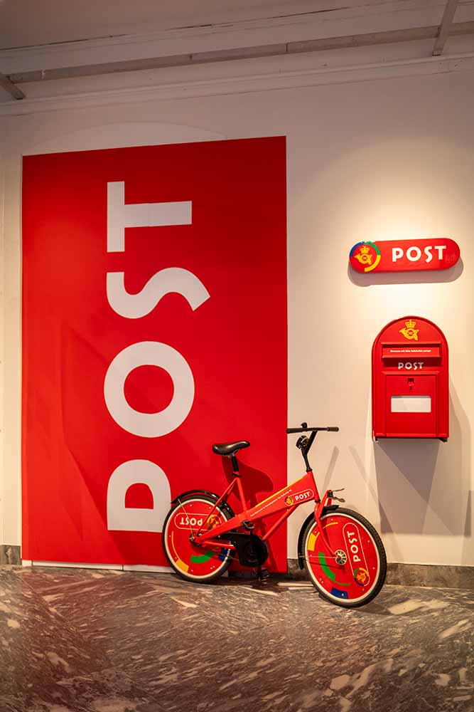 The Danish postal service logo and post boxes exhibited at the Design Museum in Copenhagen